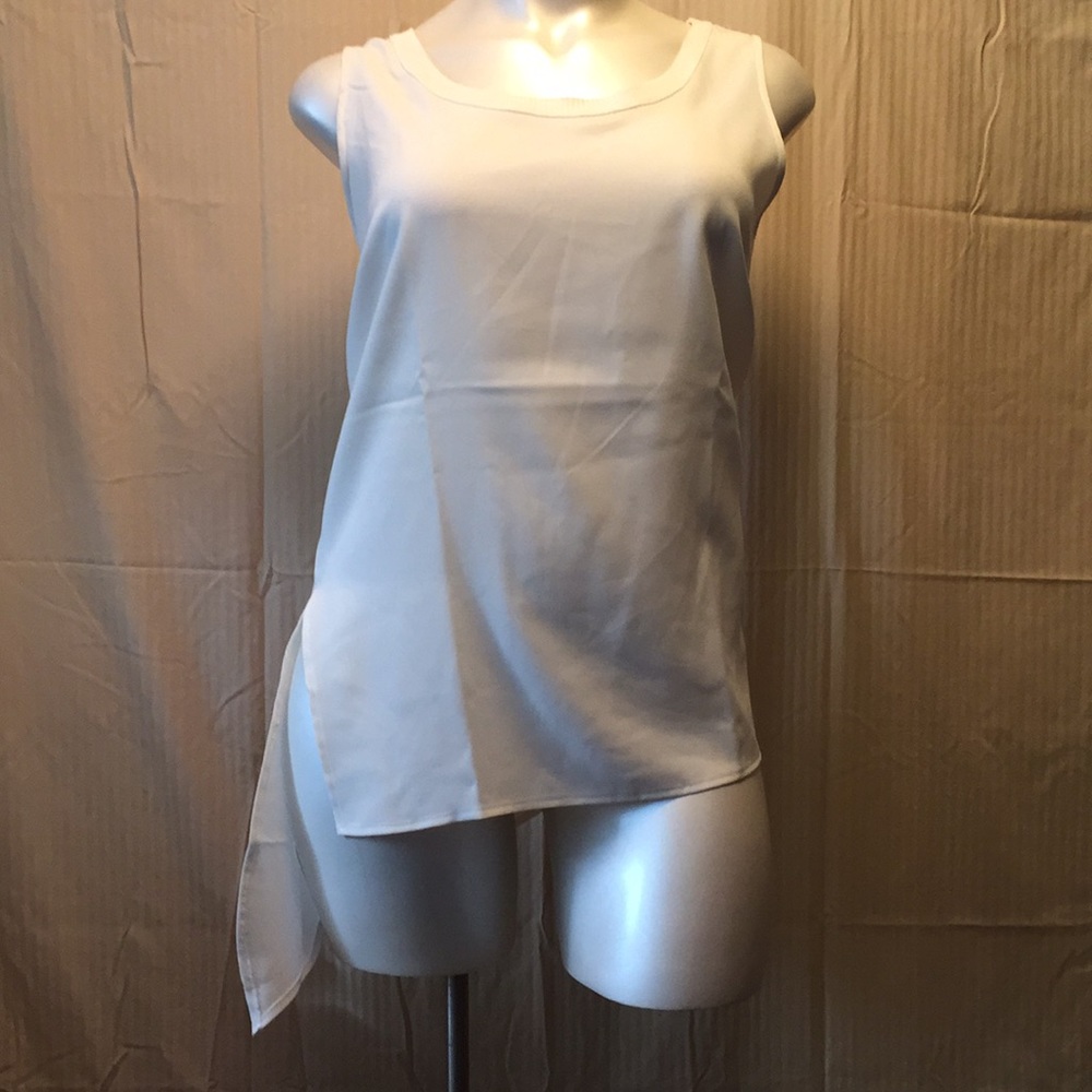 Cream sleeveless blouse
